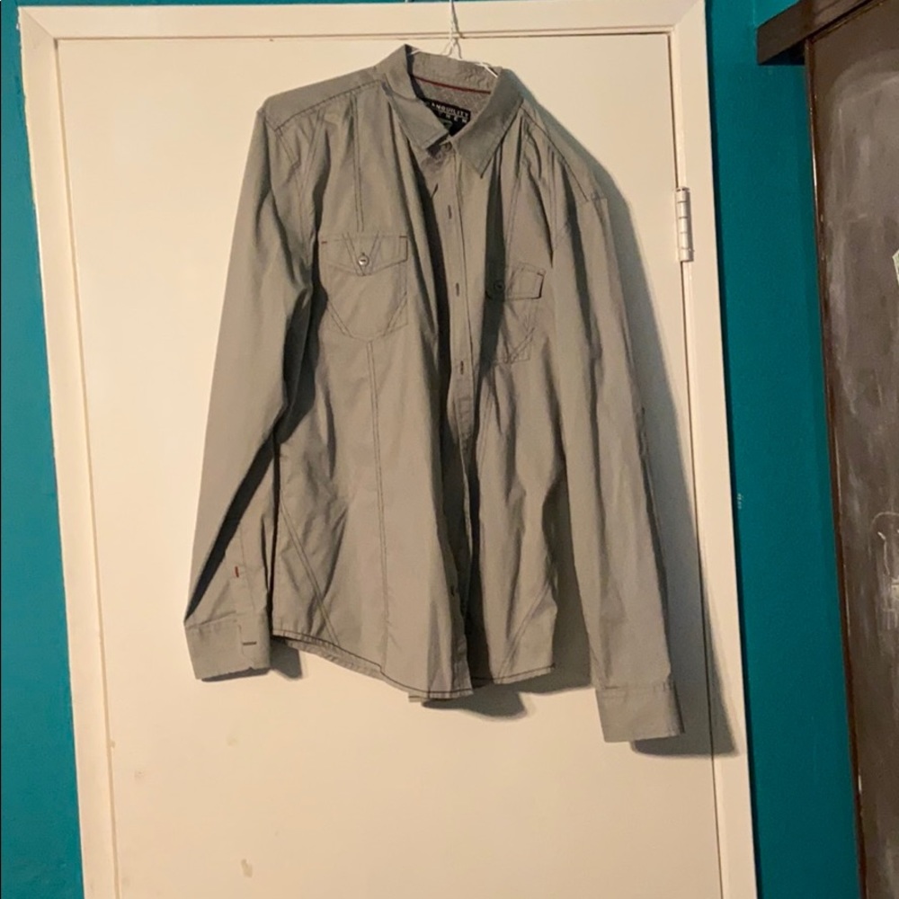 Grey buttoned up
